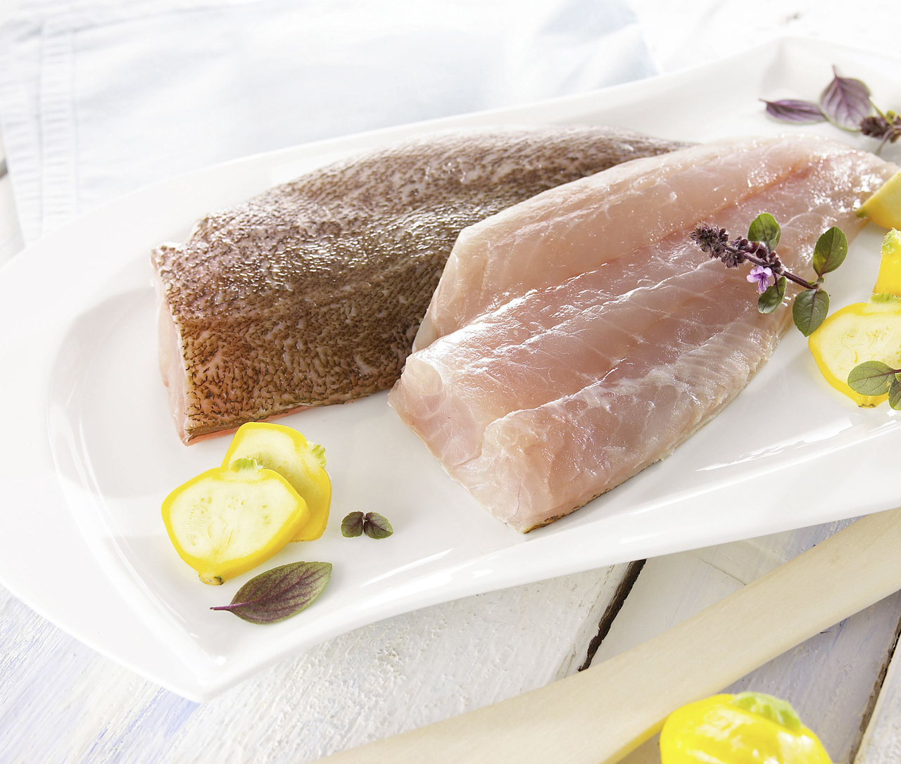 Zackenbarschfilet mit Haut ca. 200 g Stücke - je kg